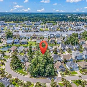 Aerial view of residential area with a large body