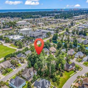 View of property location with a nearby body of wa