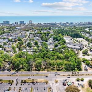 Aerial view of a tree filled landscape and a large