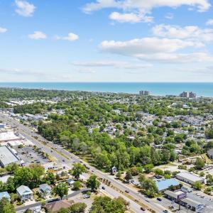 View of urban area with a tree filled landscape an