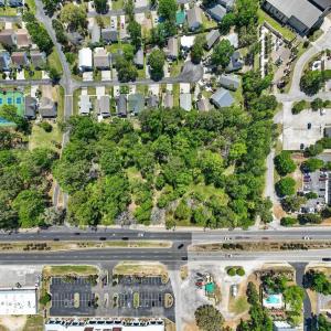 Aerial view of property and surrounding area with