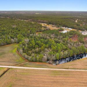 Drone / aerial view of a large body of water and a