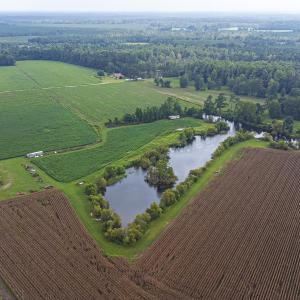 Aerial view of property and surrounding area featu