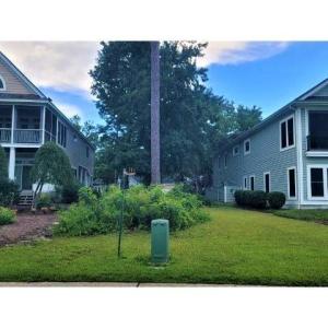 View of property's community featuring a sunroom a