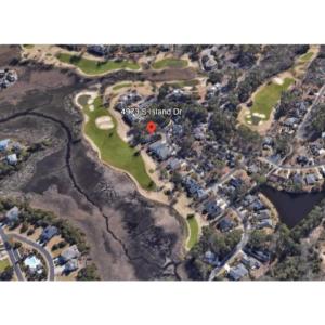 Aerial view of property's location featuring a gol