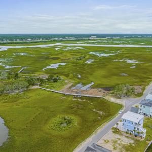Aerial perspective of suburban area with a nearby