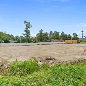 Surrounding community featuring view of wooded are
