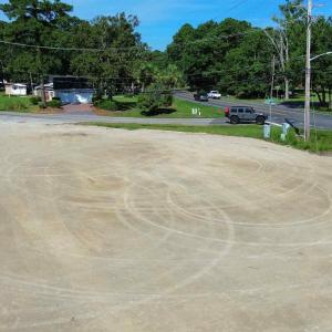View of asphalt street with street lighting and vi