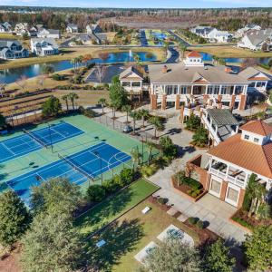 Aerial perspective of suburban area with a nearby