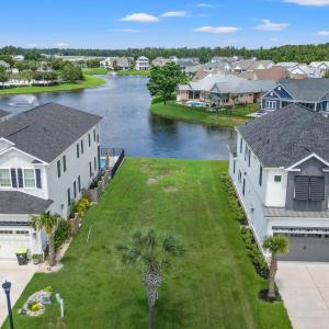 Aerial perspective of suburban area with a nearby