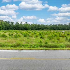 View of asphalt road with a view of countryside