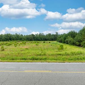 View of asphalt road featuring a view of countrysi