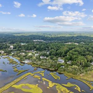 Aerial view of a large body of water and a forest
