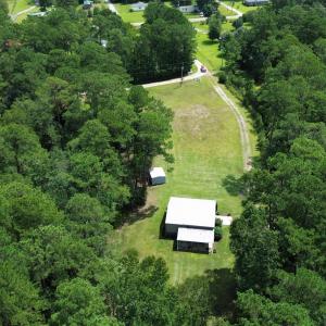 View of property location with a forest