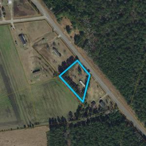 Aerial view of property's location with property p