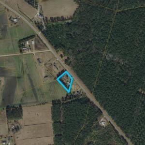 Aerial view of property's location with property p