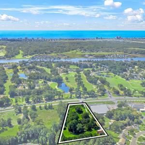 Aerial view of property's location featuring prope