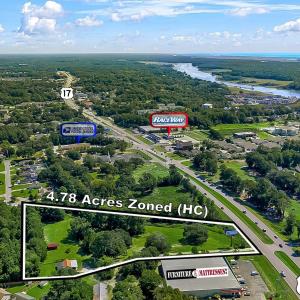 Aerial view of property's location featuring prope