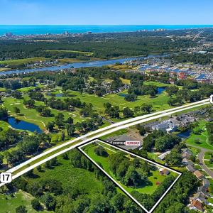 Aerial view of property and surrounding area featu