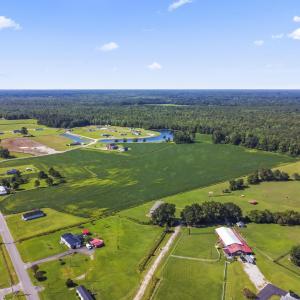View of rural area featuring a forest and a nearby