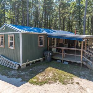 View of front of house featuring a metal roof