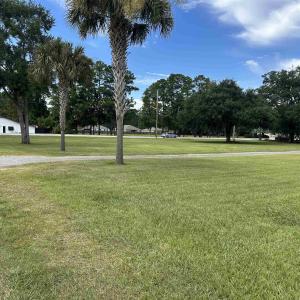 View of home's community featuring a lawn