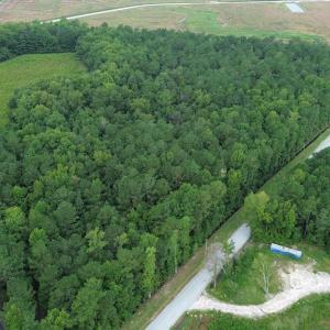 Aerial view of property and surrounding area with