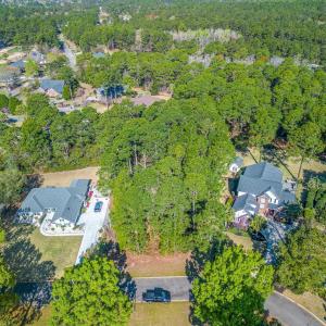 Aerial view of property and surrounding area with