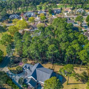 Aerial view of property and surrounding area with
