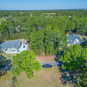Aerial view of property and surrounding area featu