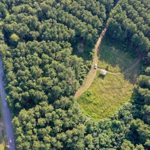 Aerial view of property and surrounding area with