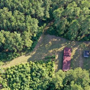 Aerial view of property and surrounding area featu