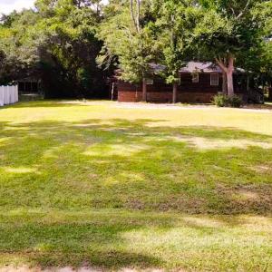 View of yard featuring view of wooded area