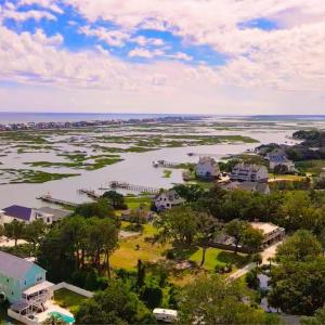 Aerial view of residential area with a large body