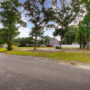 View of asphalt road with traffic signs