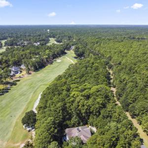 Aerial view of property and surrounding area with