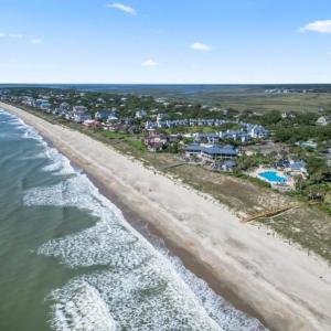 Aerial view of residential area with expansive bea