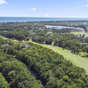 Aerial view of a large body of water and a golf co