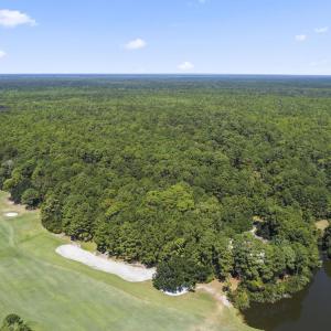 Aerial view of property and surrounding area with