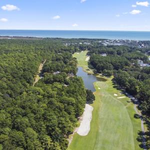 Aerial view of property's location with a large bo