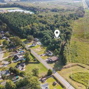 Aerial view of property and surrounding area featu