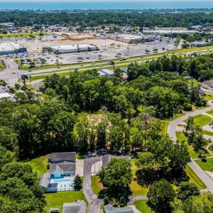 Aerial perspective of suburban area featuring a tr