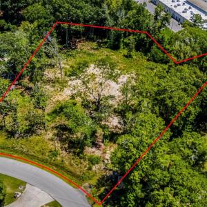 Aerial view of property and surrounding area with