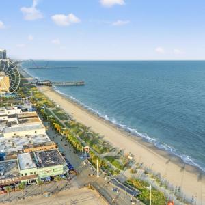 View of urban area featuring expansive beach