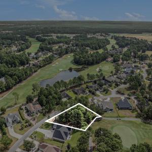 View of property location with a golf course;  pro