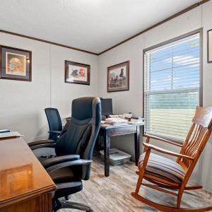 Office space with ornamental molding, light wood-s