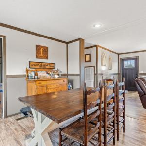 Dining space with washer / dryer, light wood-style