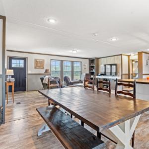 Dining space with crown molding, light wood-type f