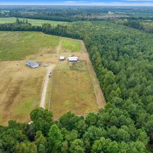 Aerial view of sparsely populated area with a heav