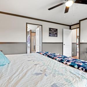 Bedroom featuring crown molding and ceiling fan